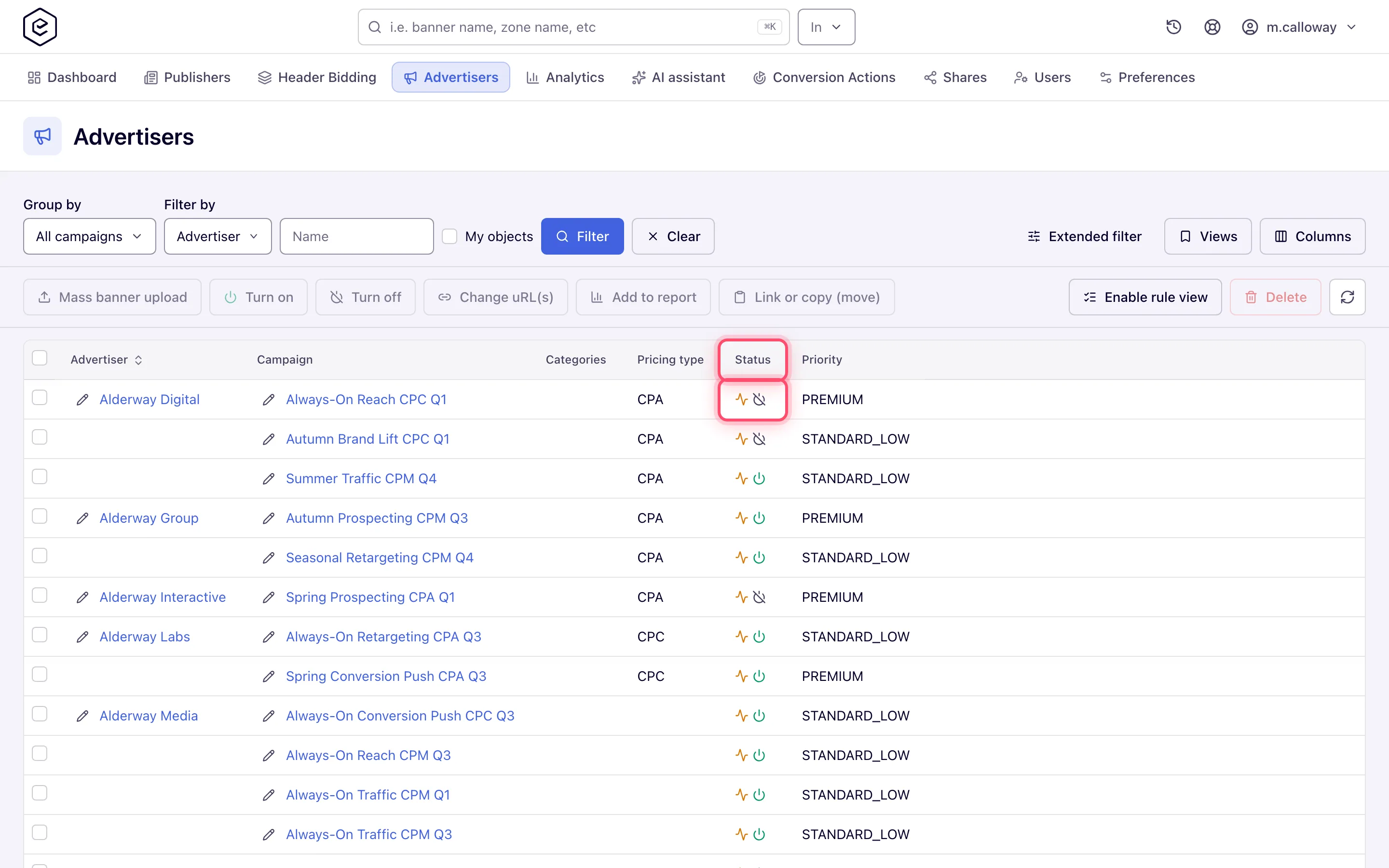 Campaigns grid with the Status column showing the activity and on/off glyphs on each row